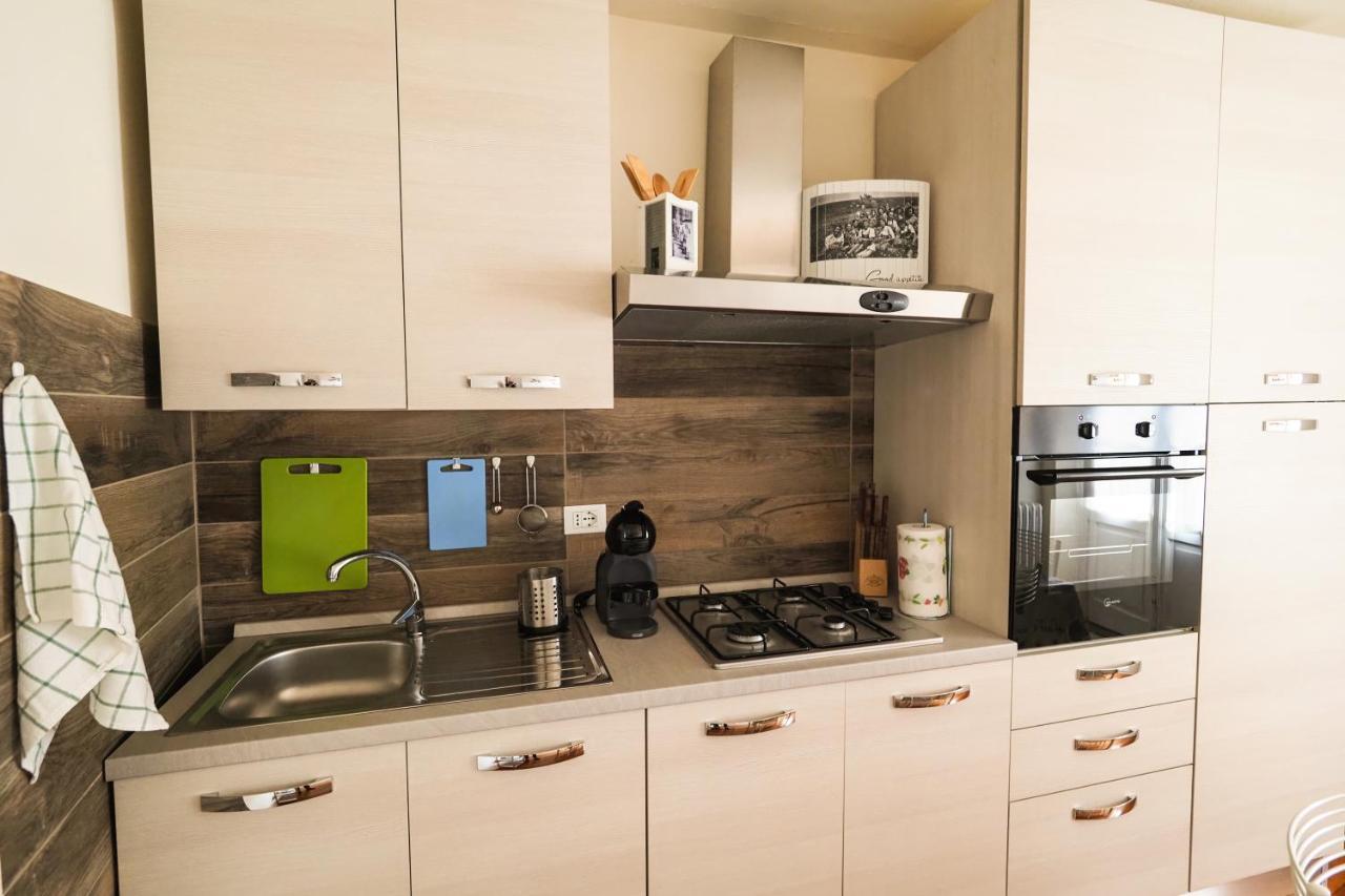 Rivacanze Apartments ลาโญ ภายนอก รูปภาพ